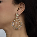 Amara I Earrings on a model.  Gold Color Earrings with Silver Metallic Crystal Beads. Non Tarnish Earrings. Metal Frame & Wire Wrapped Earrings