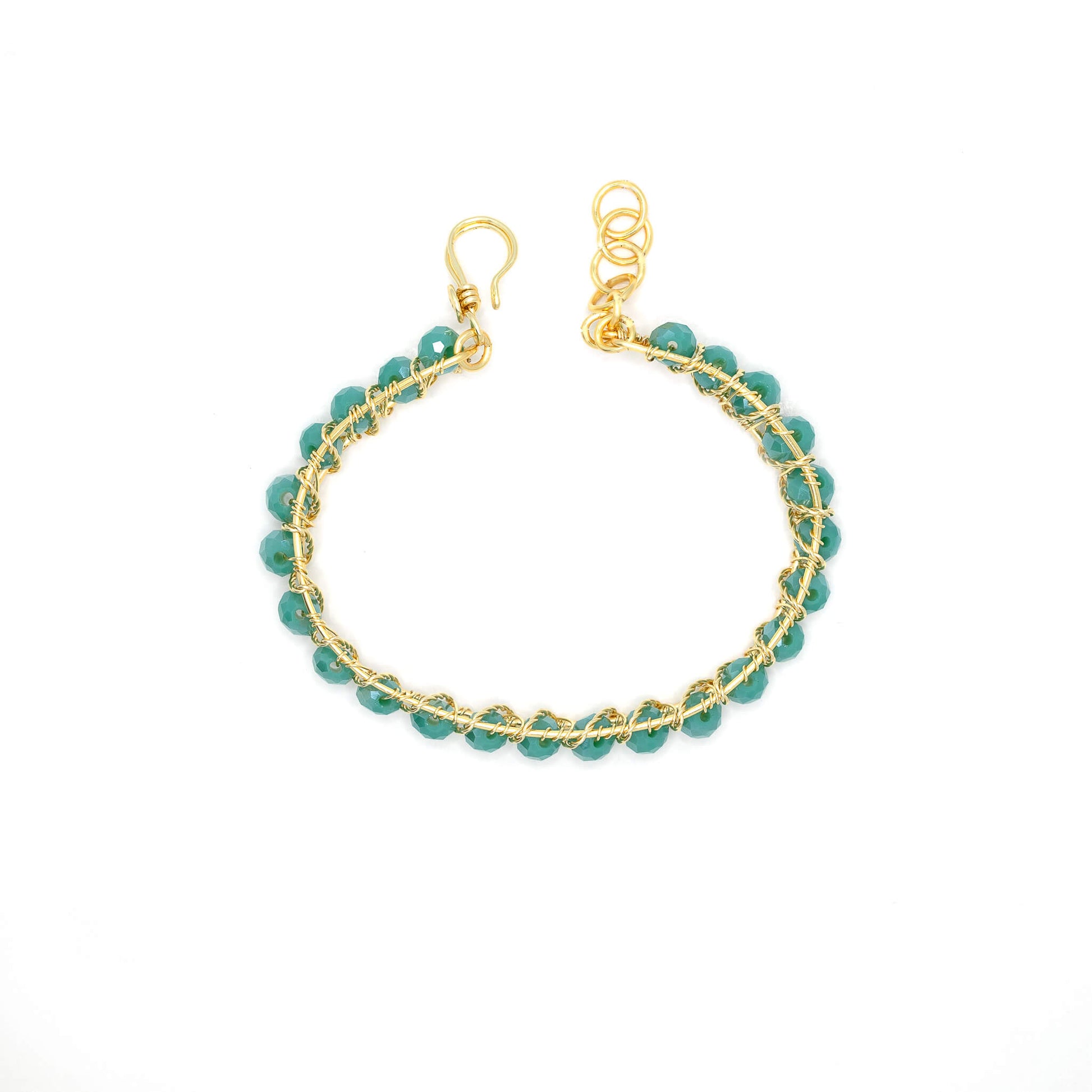 Bogen Bracelet is one size fits all. Gold and Green bracelet. Handmade with Non-tarnish Gold plated wire and beads crystals. Wire-wrapped beaded bracelet. (Flat)