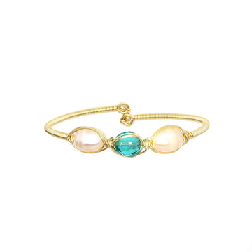 December Birthstone Crystal Gold Bracelet. Light Blue Crystal, Fresh Water Pearls and Non tarnish Gold color wire. Wire Wrapped Bracelet.
