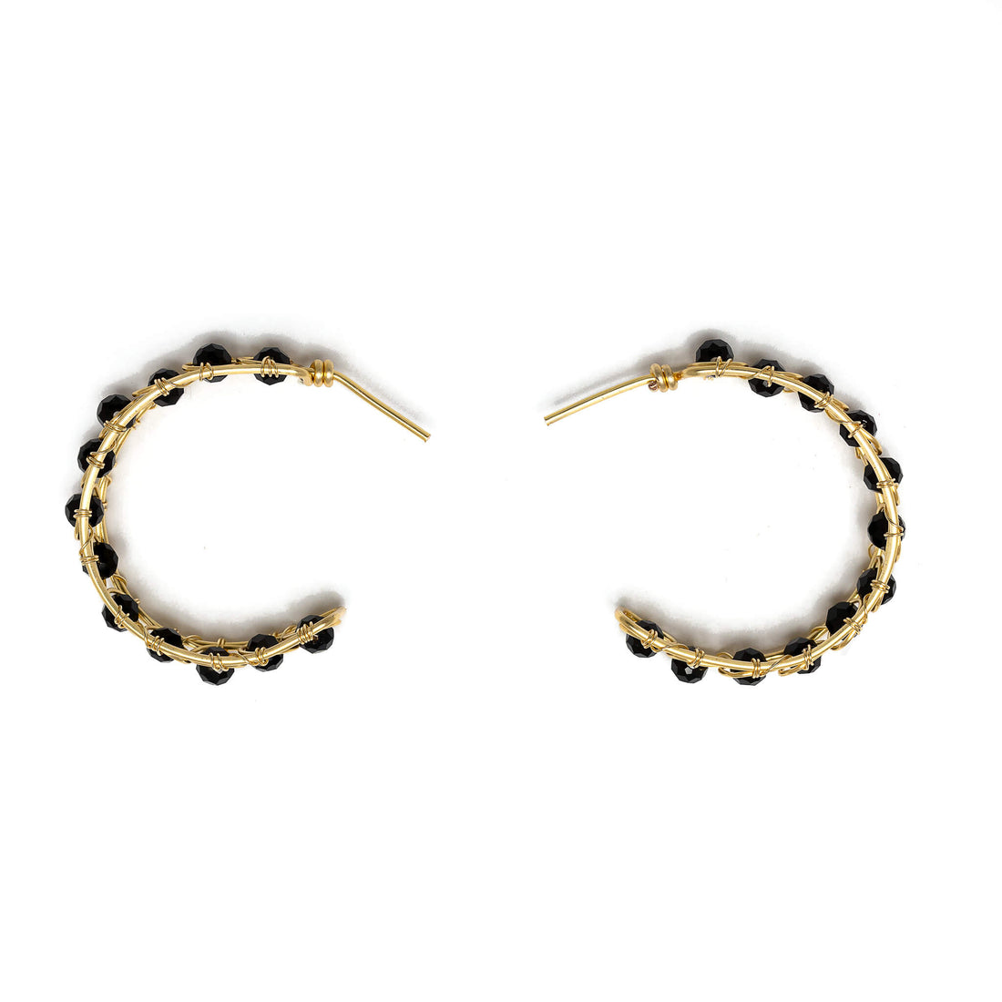Catania Hoop Earrings are 1.25 inches long. Gold and black earrings. Handmade with gold-plated wire and faceted crystals. Beaded round Hoops. Simple Wire Wrapped Earrings