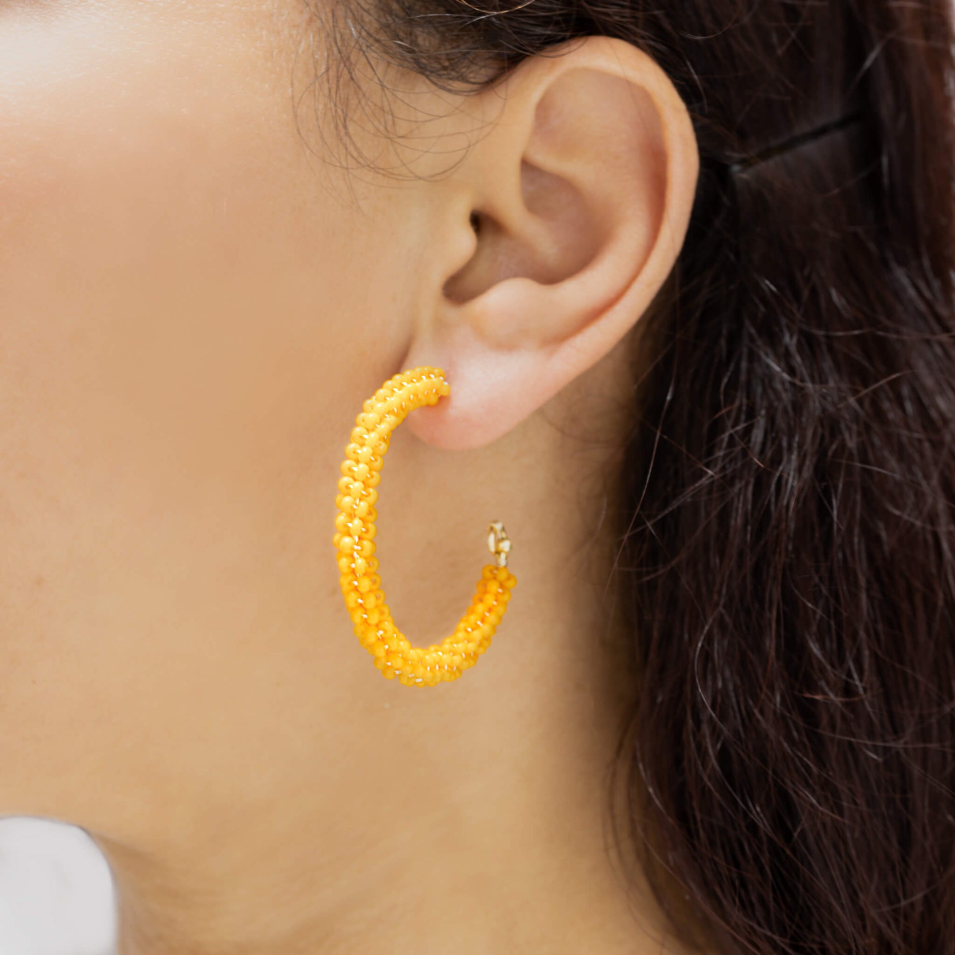 Florence Hoop Earrings Gold on a model. Gold Color Earrings with Seed Beads  Crystals. Wire Wrapped Earrings.