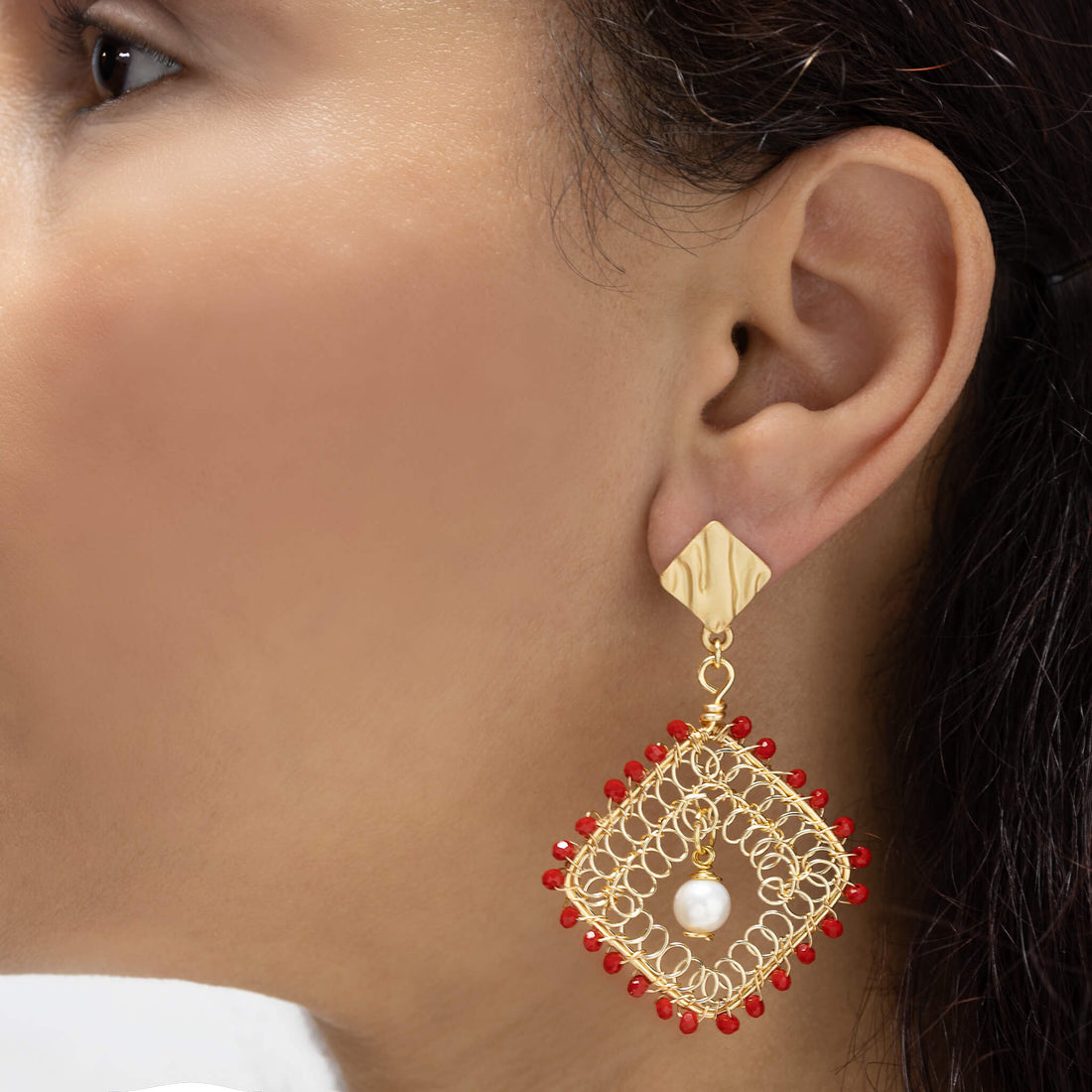 The Myra Earrings are 2.5 inches long. Gold geometric Earrings. Gold, Red, and White earrings. Handmade with Czech seed bead crystal and freshwater pearls. Wire Wrapped Earrings.