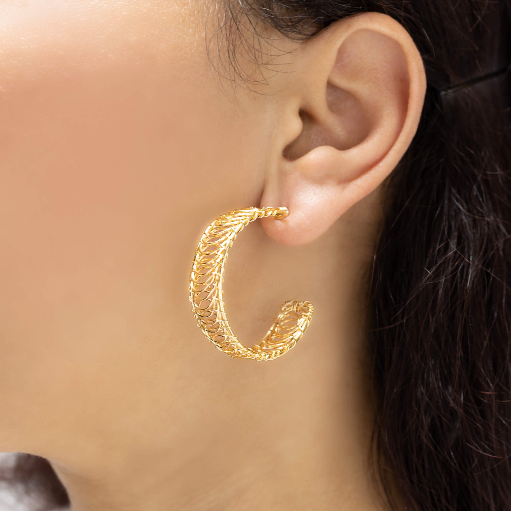 Prato Hoop Earrings on a model. Gold Color Wire. Wire Wrapped Earrings.