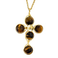 Brown Tiger Eye cross necklace in gold wire with 14K gold-filled chain. The Encourage Cross.