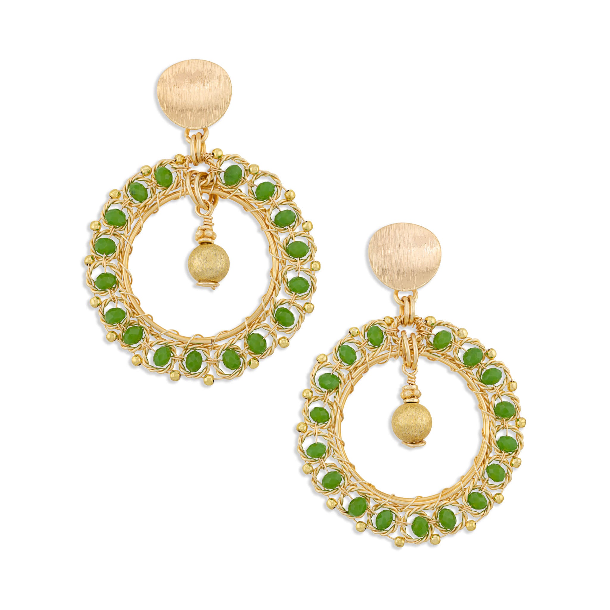 A pair of gold-toned statement dangle earrings featuring circular openwork wire frames accented with small green stones, a central gold bead drop, and a round textured gold post with a flat back.