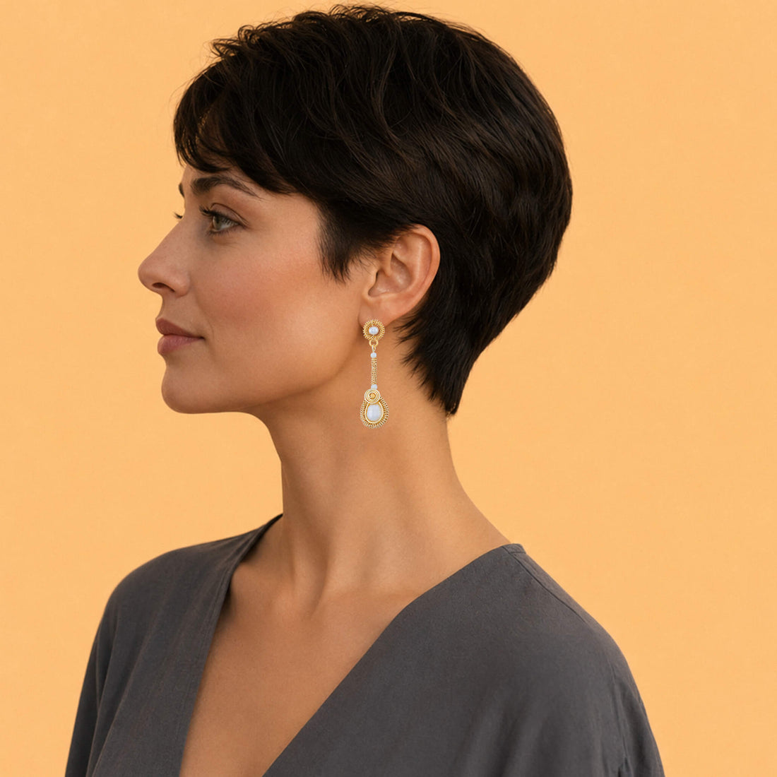 Gold wire-wrapped freshwater pearl drop earrings with halo studs, linear columns, and teardrop pearl drops