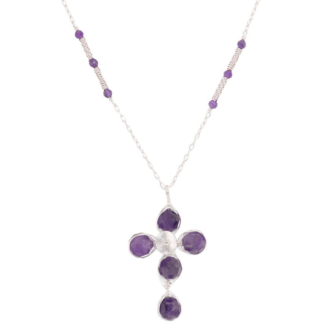 Silver amethyst cross necklace with five faceted purple stones and amethyst accents along the chain