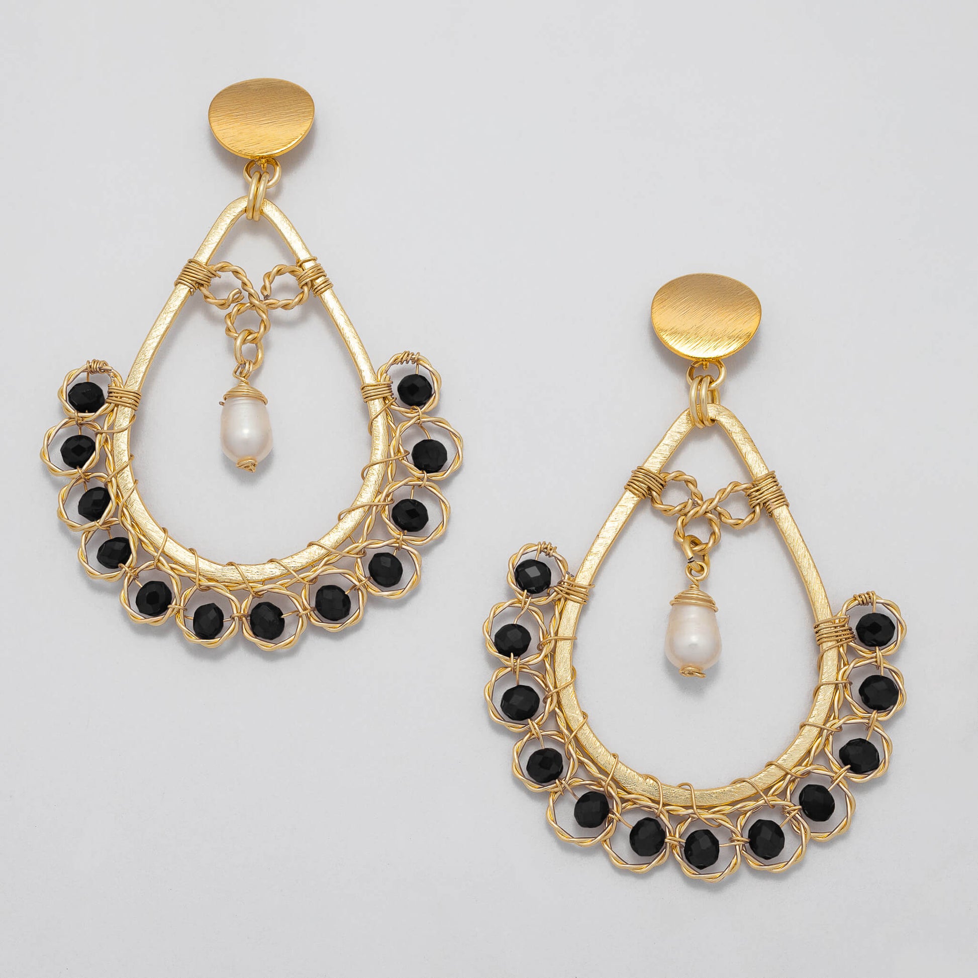 Amara I Earrings are 3 inches long. Gold teardrop Earrings. Gold, Black, and White earrings. Handmade with Faceted Crystal beads and freshwater pearls. Wire Wrapped Earrings.