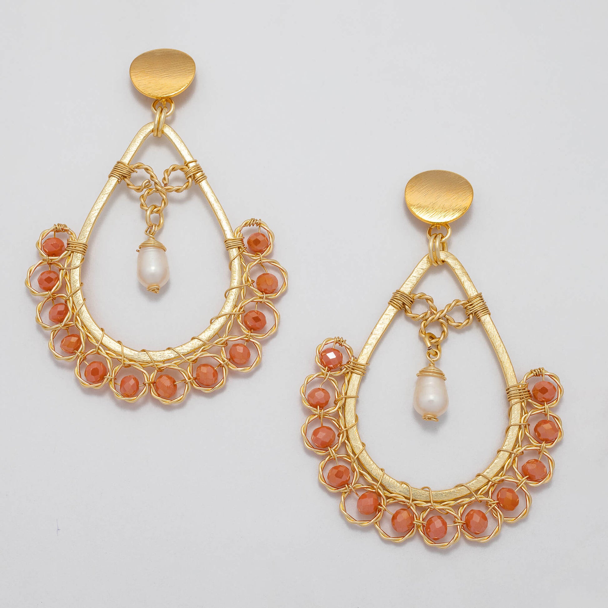 Amara I Earrings are 3 inches long. Gold teardrop Earrings. Gold, Orange, and White earrings. Handmade with Faceted Crystal beads and freshwater pearls. Wire Wrapped Earrings.