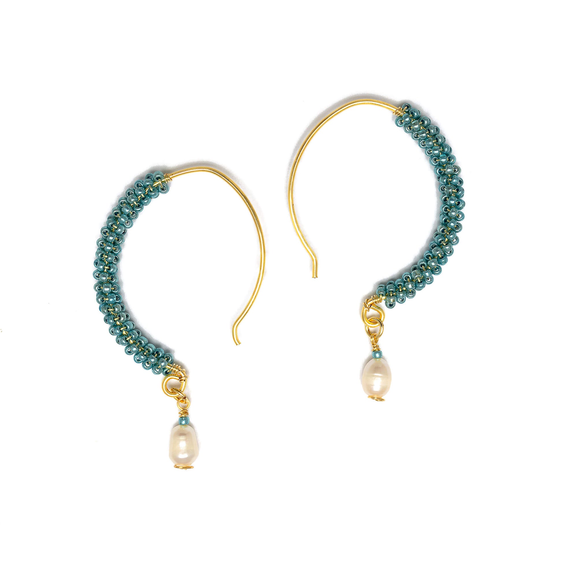 Ancora Gold Hoop Earrings are 2.5 inches long. Gold, Aqua, and White hoops. Handcrafted with Seed Beads Crystals, gold-plated wire, and freshwater pearl. Beaded Fish hook earrings.
