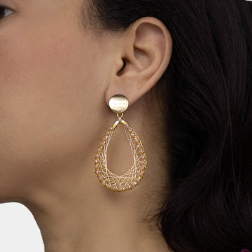 Barsha  Earrings  on a model.  Gold Color Earrings with Peach Crystal Beads. Dangle Earrings. 