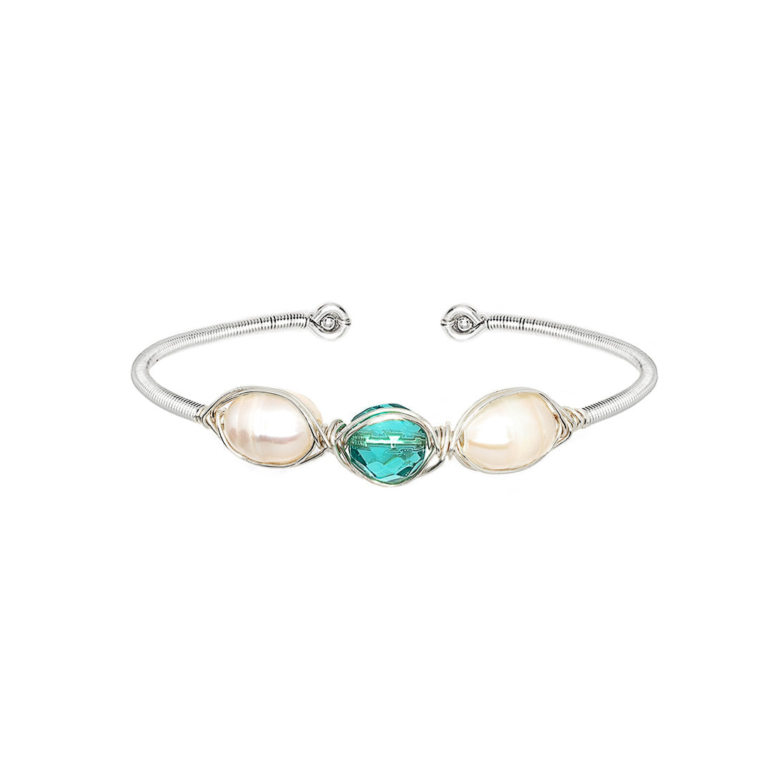 December Birthstone Crystal Silver Bracelet. Light Blue Crystal, Fresh Water Pearls, and Non tarnish Silver color wire. Wire Wrapped Bracelet.