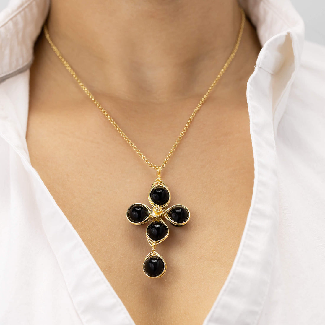 Self confidence Cross Pendant Necklace is 2.5 inches long on a 16 inches 22K gold plated chain. Handmade with Non-tarnish gold plated wire and Polished Black Onyx Beads. Gold and black minimalist Wired Wrapped Cross.