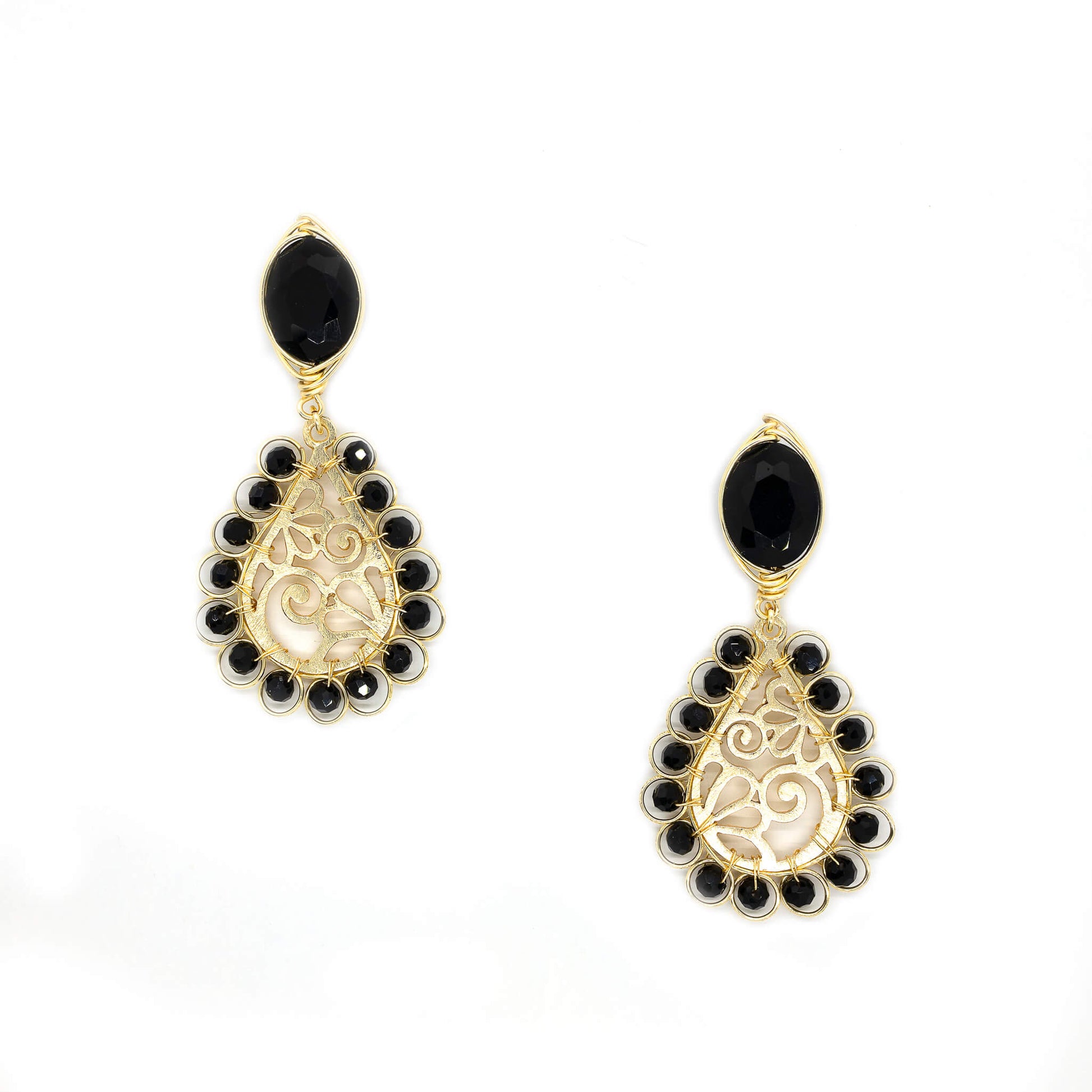 Ekani Earrings are 2.5 inches long. Gold and Black earrings. Wire wrapped teardrop earrings. Handmade with non-tarnish gold plated wire and Crystal beads. Dangle earrings.