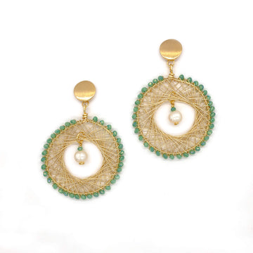 The Farida Earrings are 2.5 inches long. Gold and Aqua green earrings. These beaded round earrings are Handmade with non-tarnish gold wire, Czech seed Beads, freshwater pearls, and a metal frame. Dangle Wire Earrings.