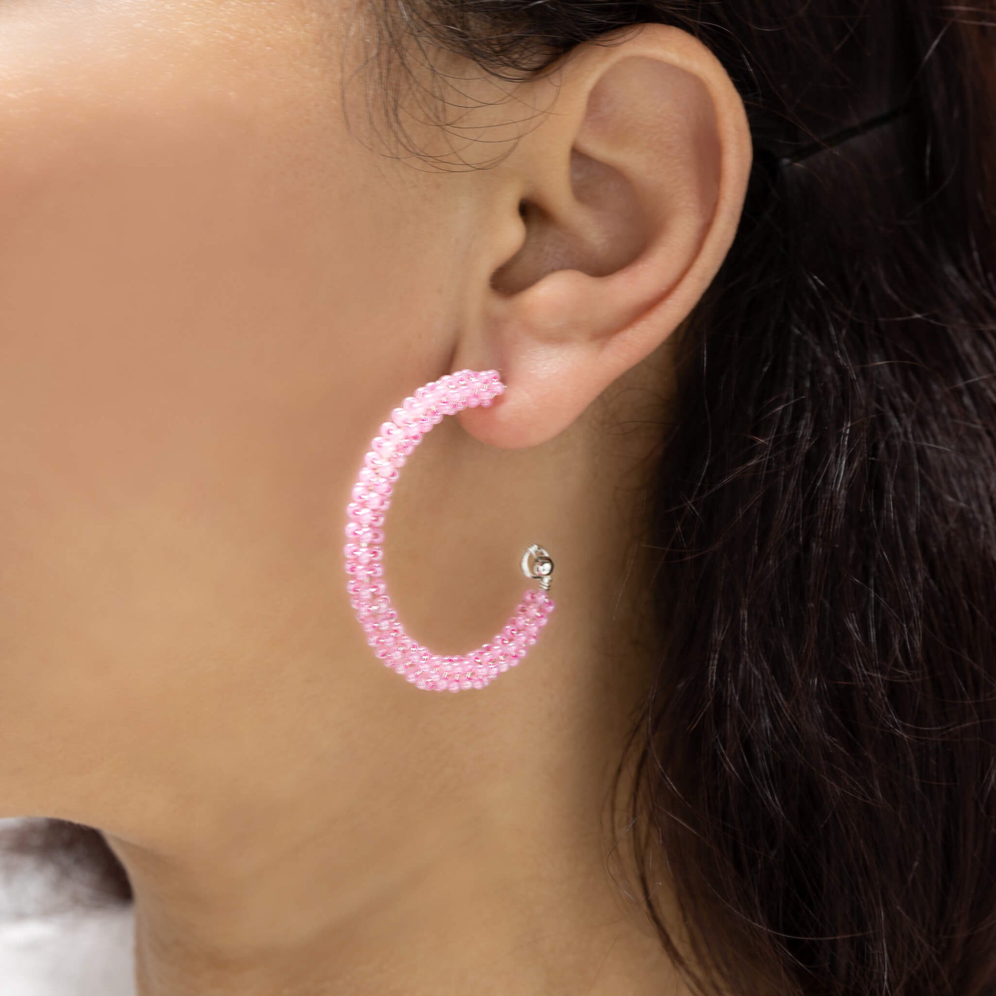 Florence Hoop Earrings Silver on a model. Silver Color Earrings with Seed Beads  Crystals. Wire Wrapped Earrings.