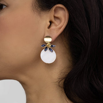 Grace II Earrings on a model. Gold Color Earrings with  dark blue Crystal Beads. Stud Earrings. Wire Wrapped Earrings