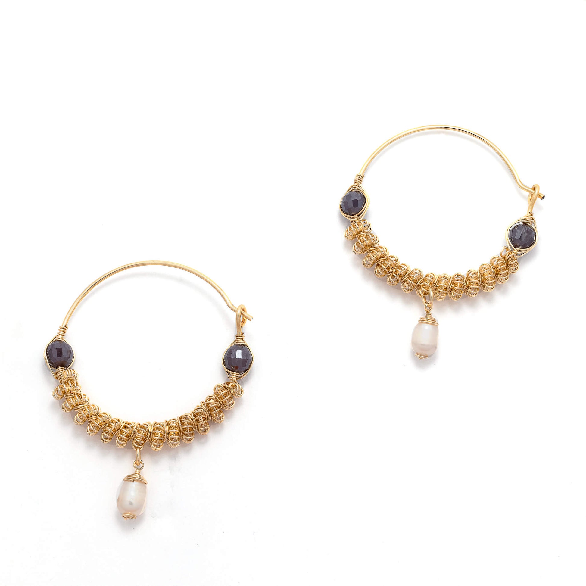 Anzio Hoop Earrings are 2 inches long. Gold, White, and Purple hoops. Handmade with non-tarnish wire, Crystal Beads, and freshwater Pearl. Round Wire Earrings.