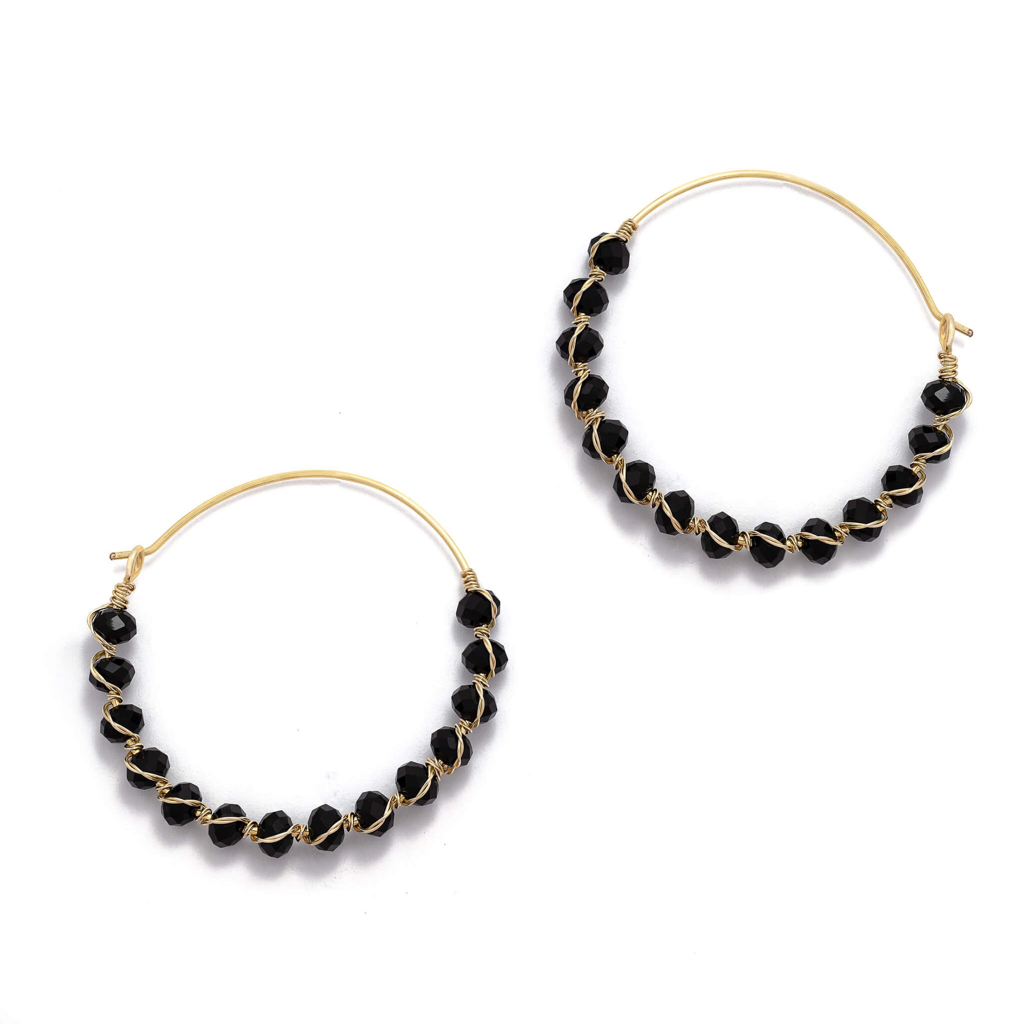 Asti Hoop Earrings are 2 inches long. Gold and Black hoops. Handmade with gold-plated wire and faceted crystals. Beaded round Hoops. Simple Wire Wrapped Earrings.