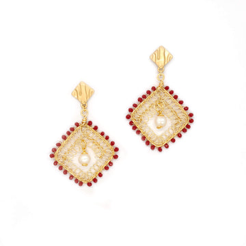 The Myra Earrings are 2.5 inches long. Gold geometric Earrings. Gold, Red, and White earrings. Handmade with Czech seed bead crystal and freshwater pearls. Wire Wrapped Earrings.
