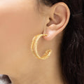 Prato Hoop Earrings on a model. Gold Color Wire. Wire Wrapped Earrings.