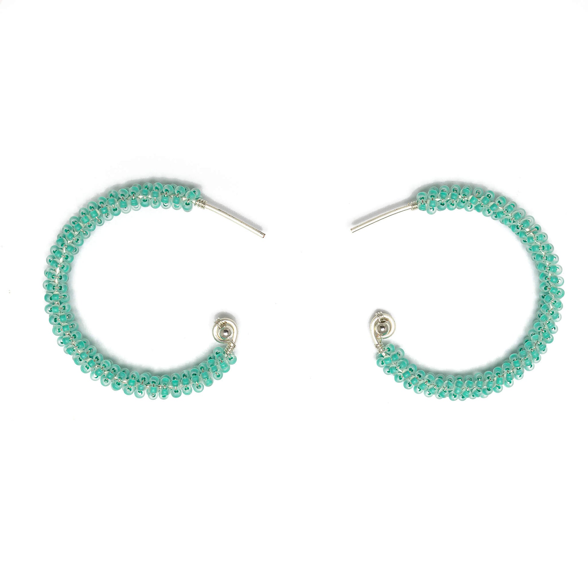 Florence Silver Hoop Earrings are 1.5 inches long, Silver and Aqua Earrings. Wire Wrapped Earrings. Lightweight and comfortable earrings. Handmade for women. Open hoop earrings