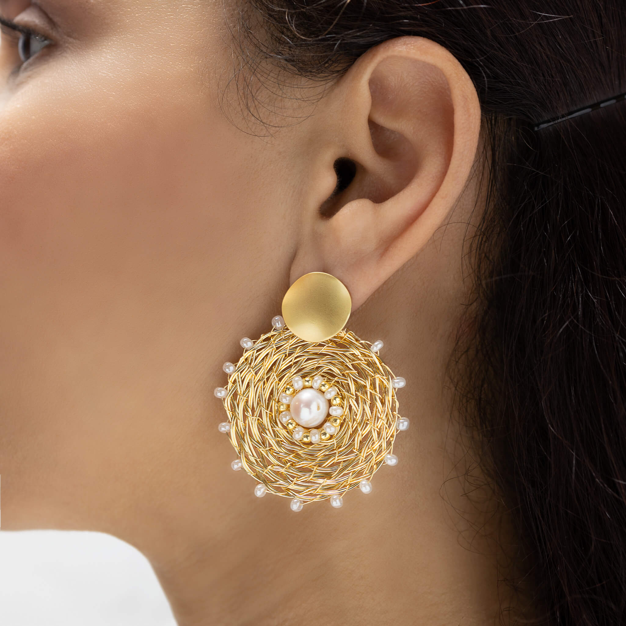 Muret II Earrings on a model. Gold Color Earrings with Fresh Water Pearl & Seed Bead Crystals.  Stud Earrings. Wire Wrapped Earrings.