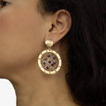 Round Gold Earrings Studs The Janya Earrings on a model. Round Dangle Earrings.