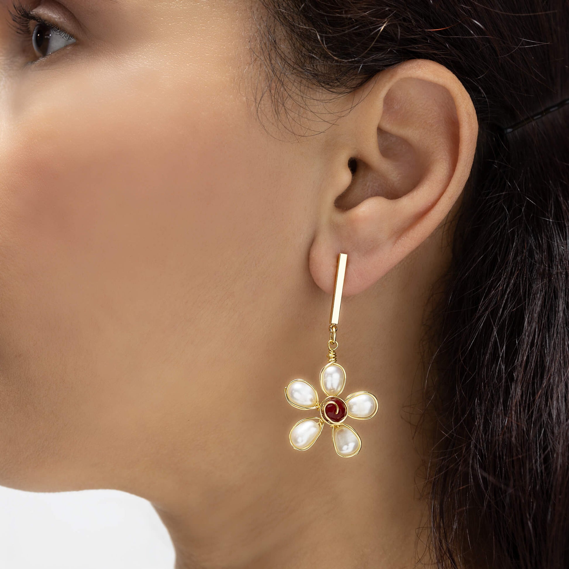 Floral Pearl Earrings. The Sade Earrings on a model. Bar Stud Earrings.