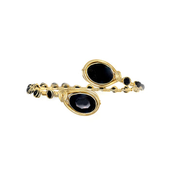 Neuss Bracelet is one size fits all. Gold and black bracelet. Handmade with Non-tarnish Gold plated wire, crystal beads, and teardrop-shaped crystals. Minimalist Wire-wrapped bracelet.